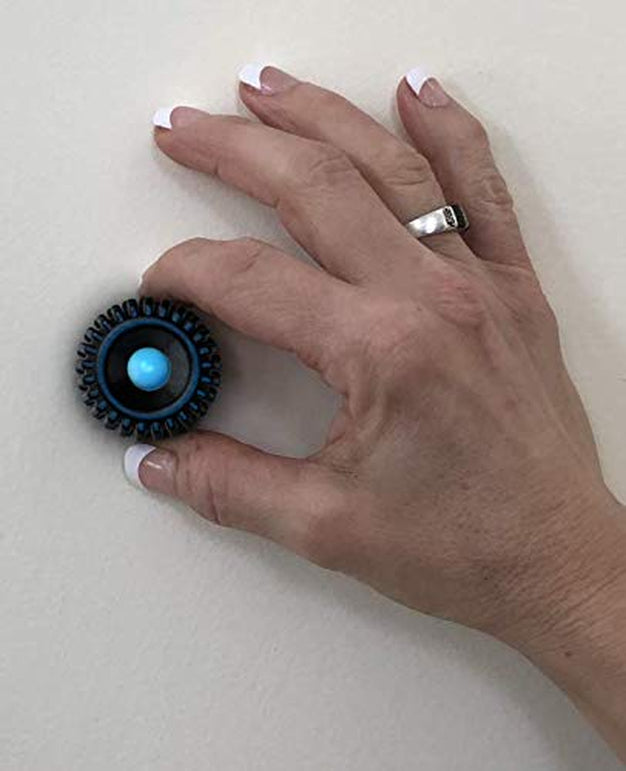 Studpop Grip Magnetic Stud Finder. Finds Metal Fasteners Holding the Wall Board to the Studs. 3/4" Diam Moving Magnet Gives an Audible Click and Visual Movement When Fastener Is Found.