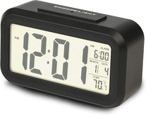 RCA Portable Alarm Clock with Auto Night Light Sensor, Adjustable Brightness, Indoor Temperature Display, Full Calendar with 12 or 24 Hour Options - The Gadget Collective